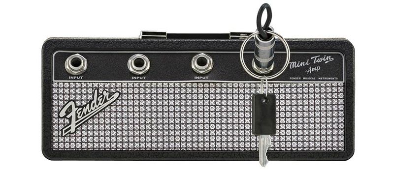 Fender  jack rack, including 4 Fender guitar plug keychains